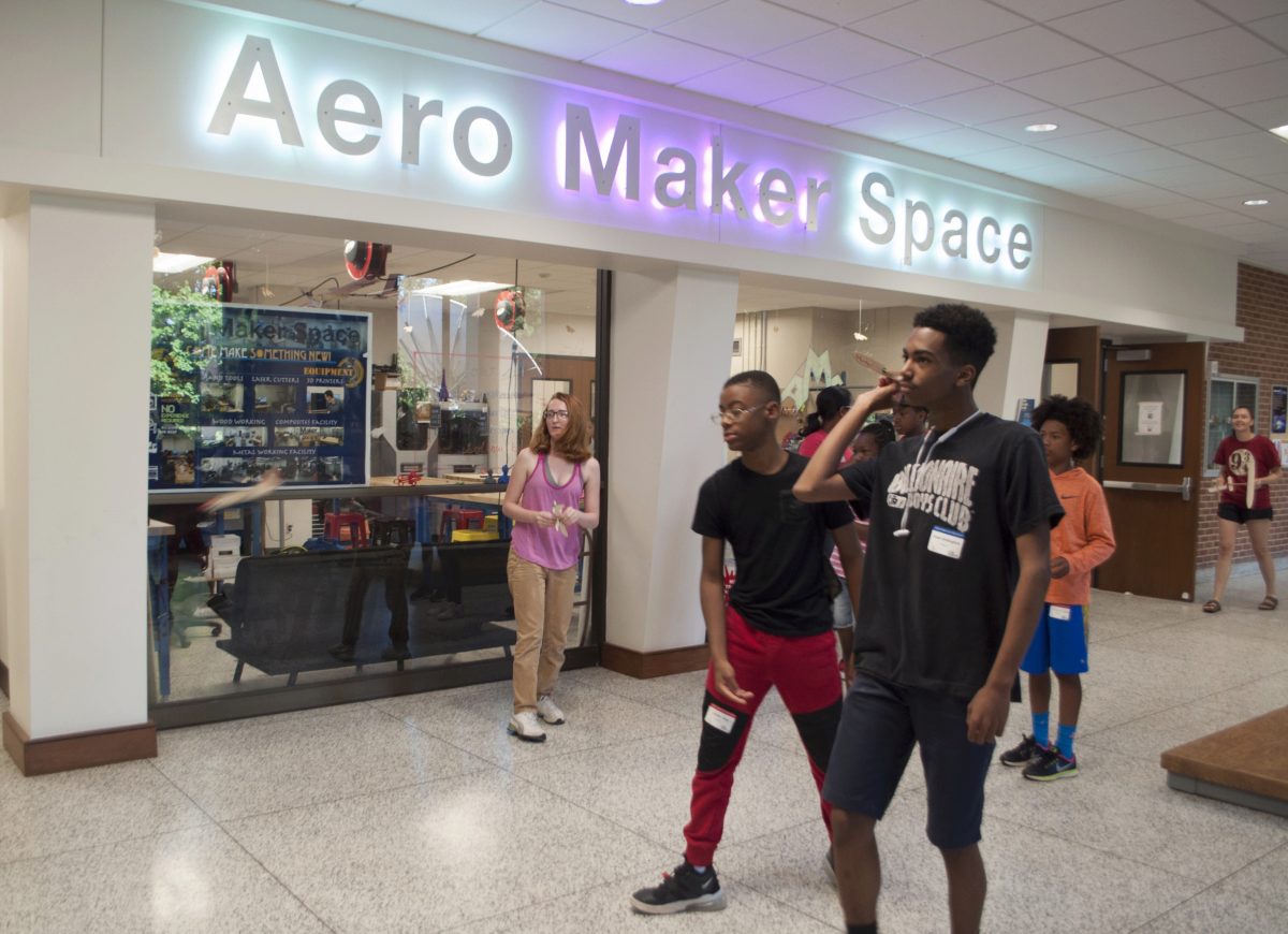 Students testing out their gliders in front of the Aero Maker Space