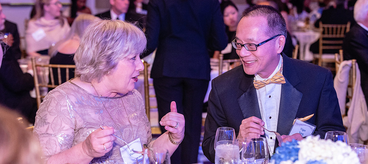 Jan Davis eating dinner with Yigor Yang