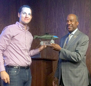 Dean Gary May receives a 3D-PRINTED plane from AE prof. Claudio DiLeo