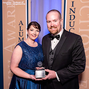 Bobby Noble and his wife accept award