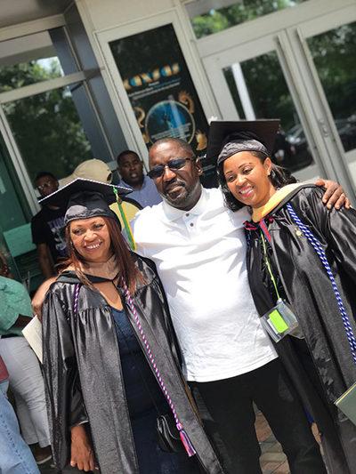 Walking Together. Sadie Marshall, her husband Harold, and her daughter LaShonya at the July 7 Commencement Exercises at St. Leo University.